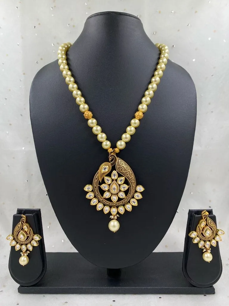 Designer Gold Plated Peacock Design Kundan Pendant Necklace Set By Gehna Shop